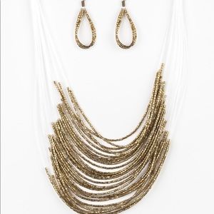 Gold catwalk necklace and earrings